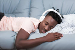 Man fallen asleep when listening to binaural beats music